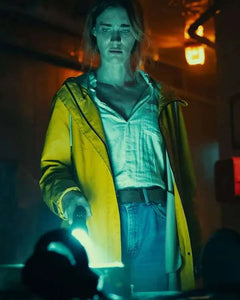 Below 2026 Mackenzie Davis yellow hooded coat