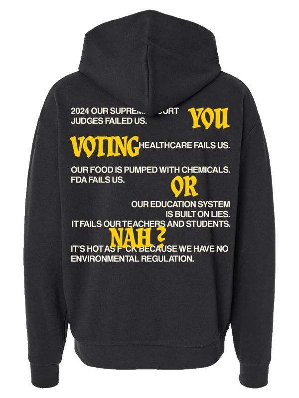 Black hoodie with large yellow and white You Voting or Nah text graphic across the back and ribbed hem