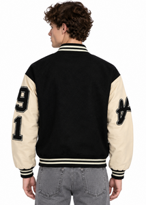 Black and white jacket with rib-knitted collar