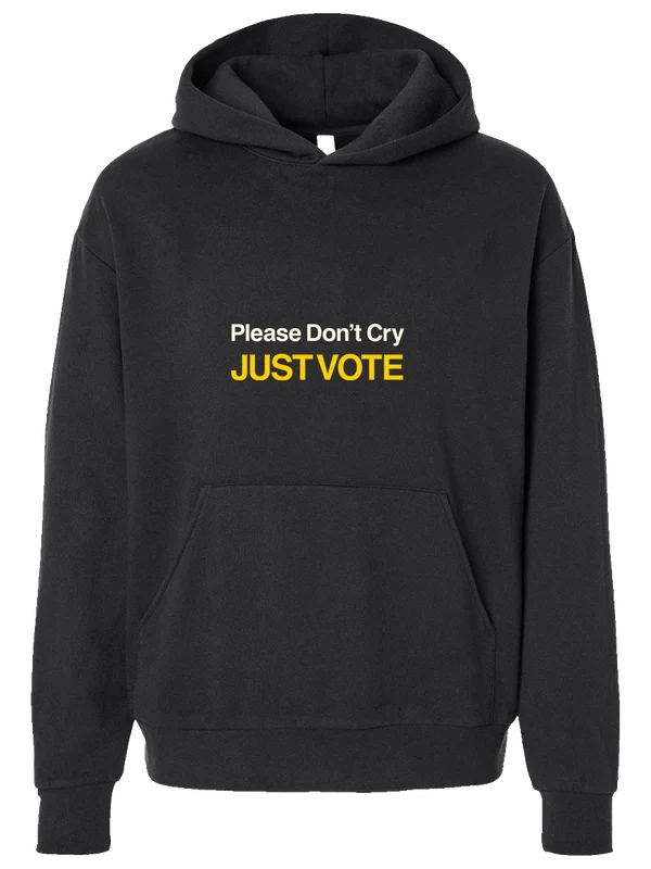 Black pullover hoodie with white and yellow Please Don't Cry Just Vote text on the chest and a front kangaroo pocket