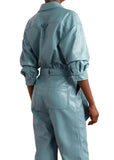 Women’s blue leather jumpsuit with chest pockets