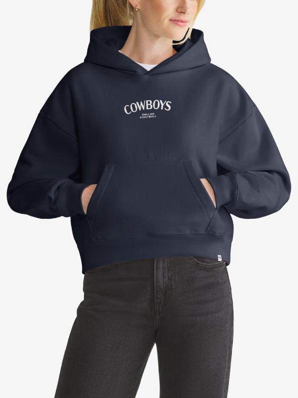 Woman wearing navy Dallas Cowboys foundation hoodie, front view with chest wordmark