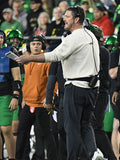 Cream crewneck sweatshirt inspired by Oregon Ducks sideline apparel