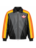 Front view of the Pikachu colorway jacket showing the yellow 3-stripe sleeve trim.