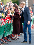 Burgundy coat featuring open-hem cuffs