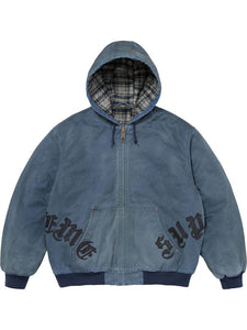 Blue washed cotton hooded jacket shown from the front, featuring plaid lining, zip closure, leather appliqué details and ribbed trim.