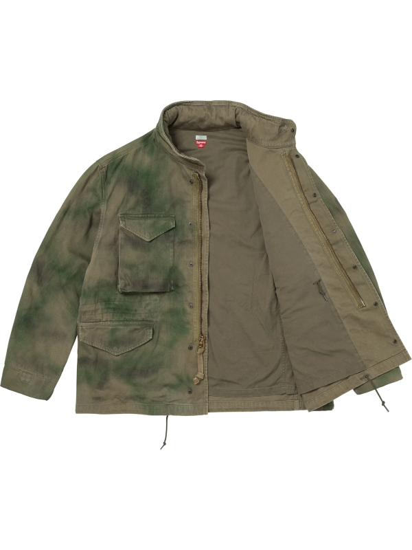Green tie-dye field jacket shown open, revealing the twill lining and interior pocket.